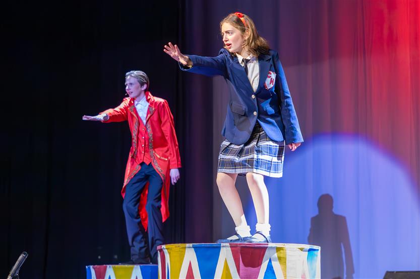 Students perform onstage